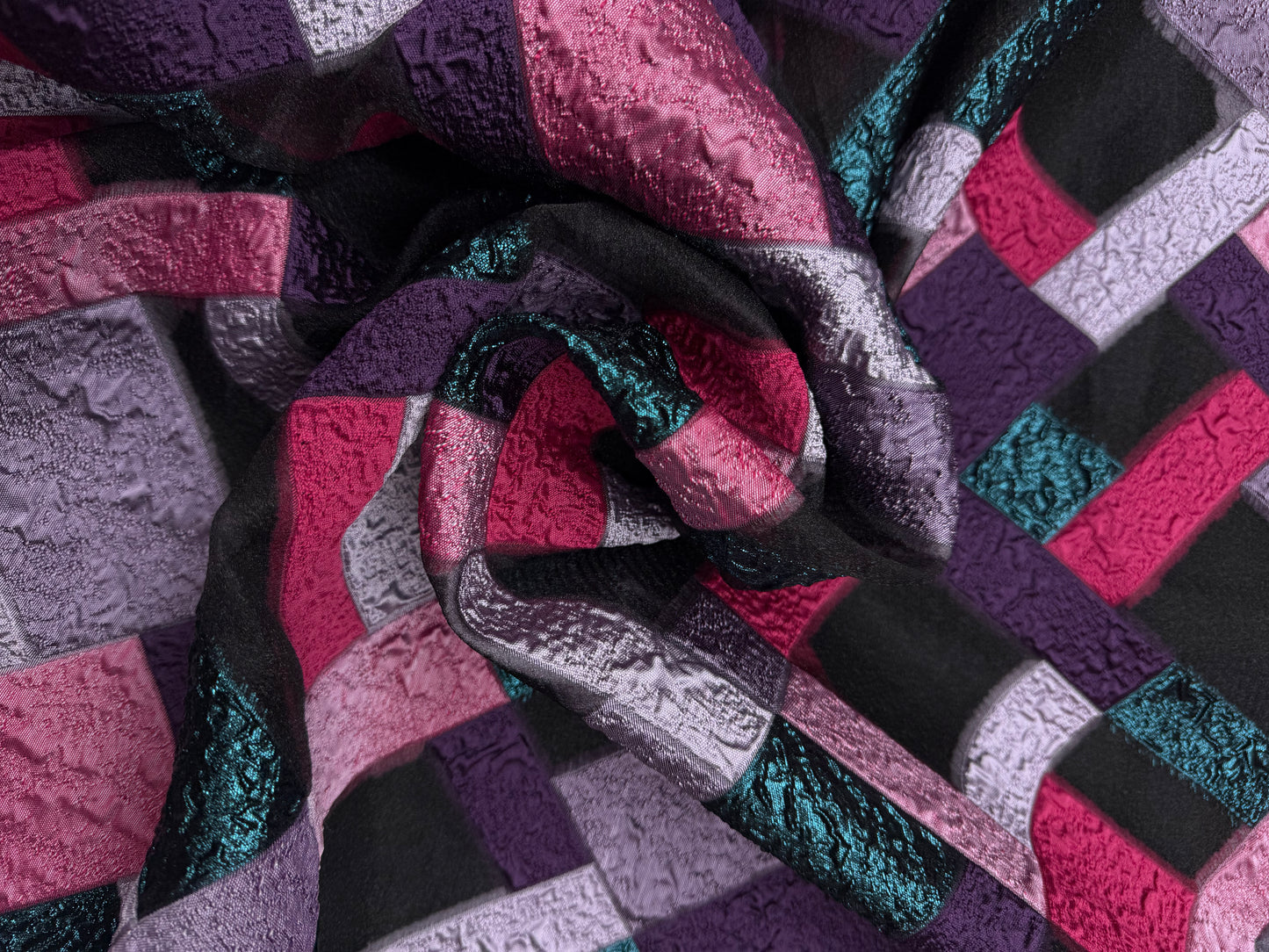 Jacquard grafisch semi transparent met lurex.