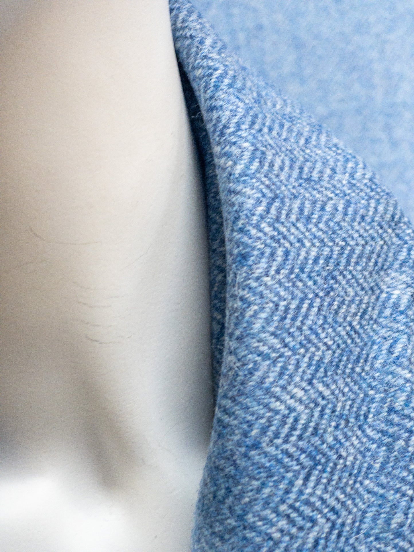 Wollen tweed in visgraat blauw