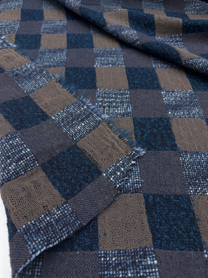 Geblokte wol blend Jaquard blauw tinten.