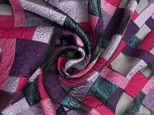 Jacquard grafisch semi transparent met lurex.