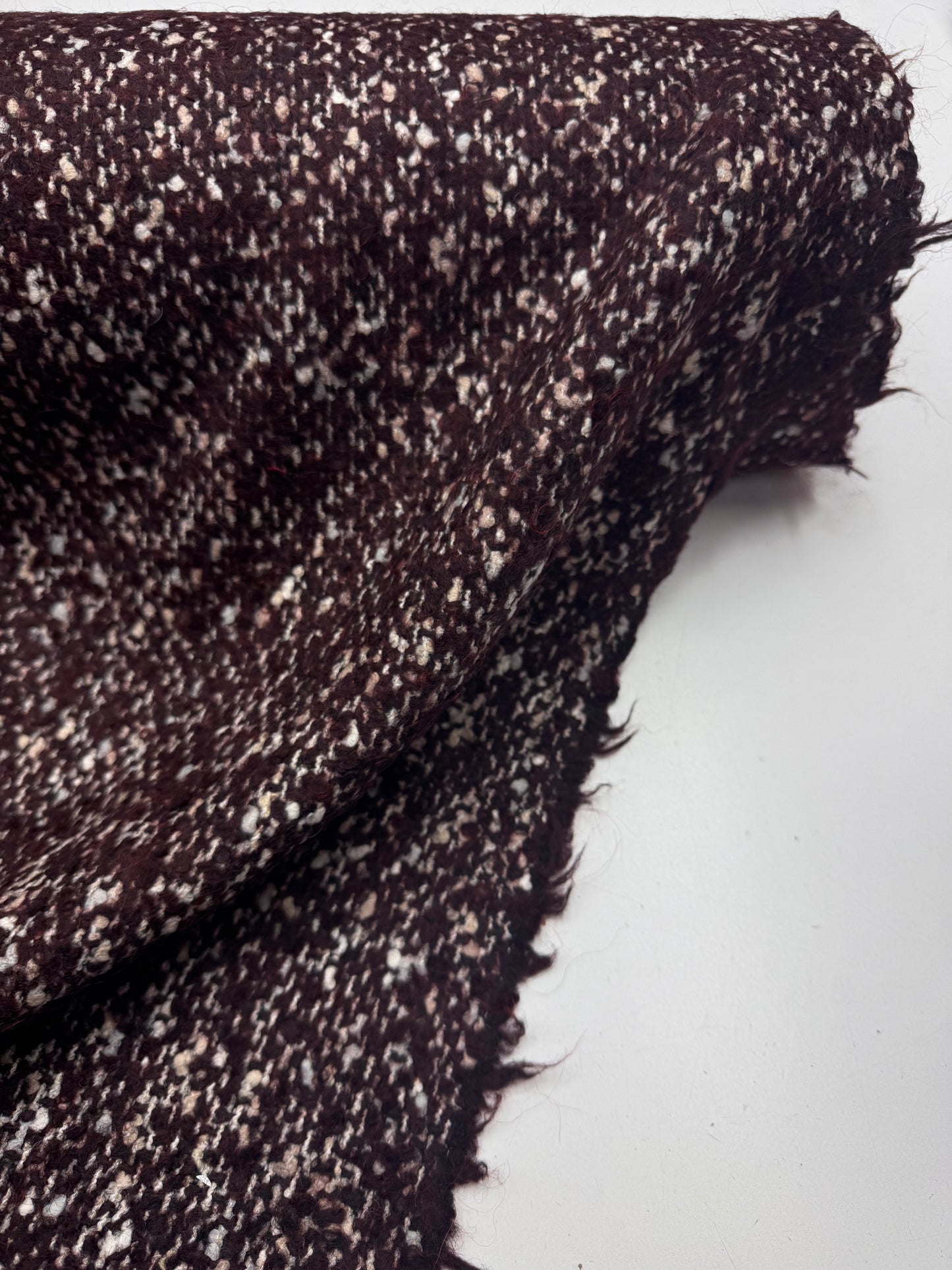 Wol boucle rood bruin gemêleerd