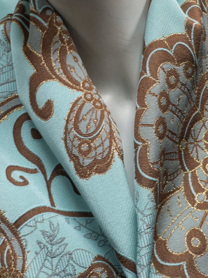 Jacquard with large abstract Paisley flower design blue brown