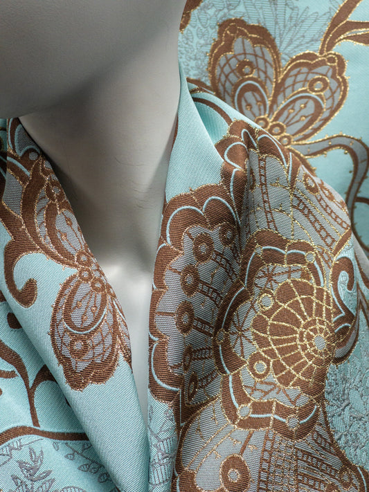 Jacquard with large abstract Paisley flower design blue brown